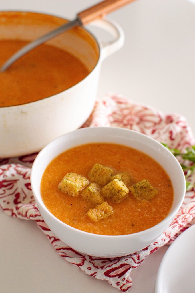 This recipe for roasted garlic and tomato soup requires minimal ingredients, but packs maximum taste. You’ll never go back to canned soups once you try this homemade rendition.