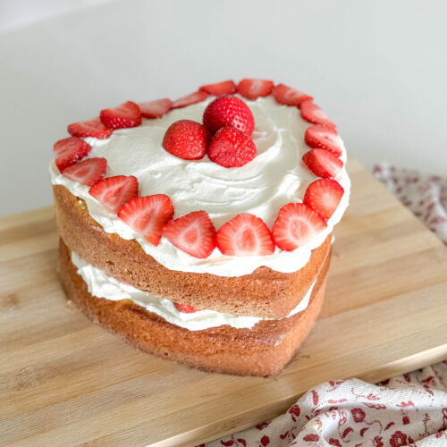 Want to make a strawberry shortcake but without all the hassle? Take a look at how we took advantage of a boxed cake and homemade cream to put together this easiest ever strawberry shortcake recipe.