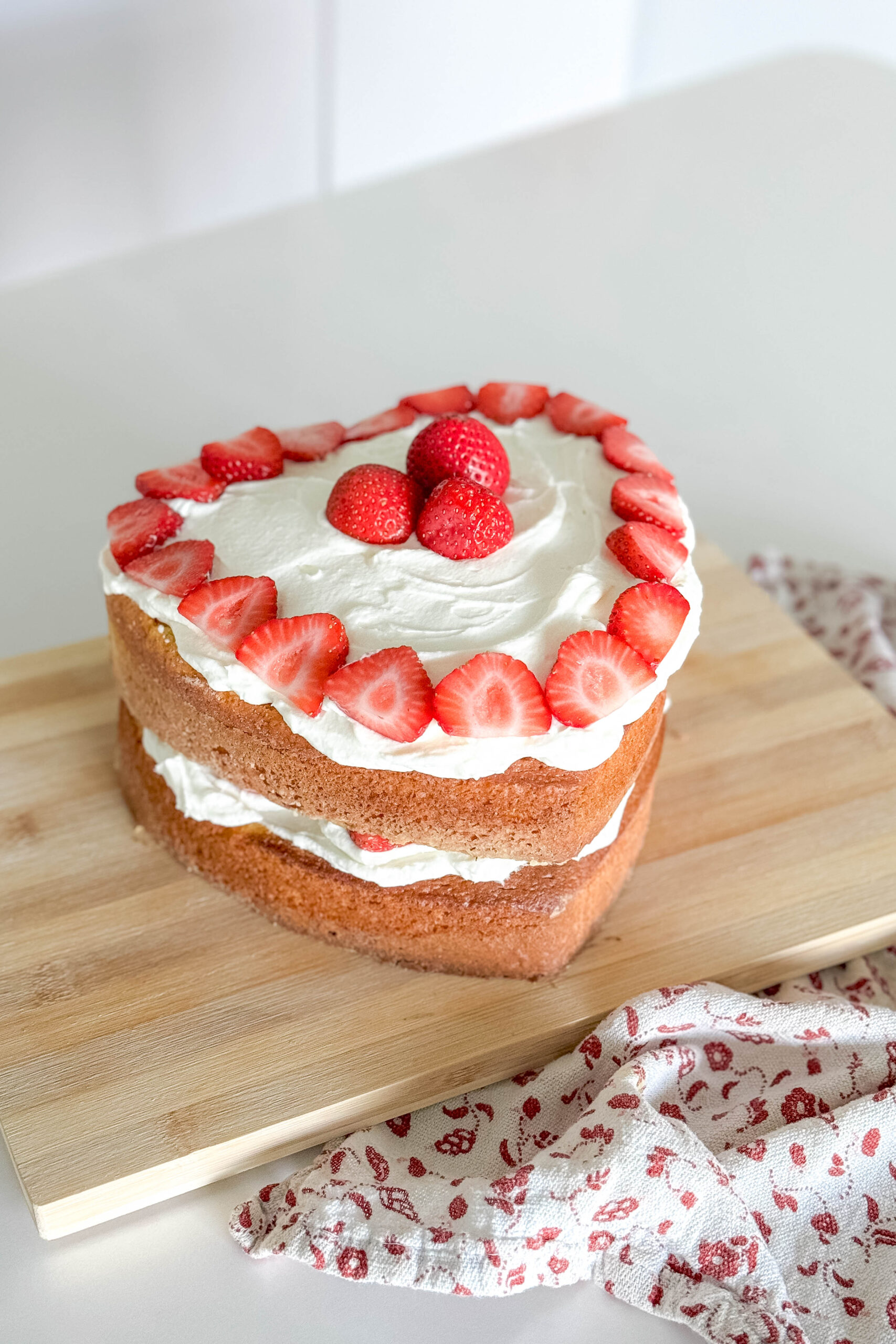 Want to make a strawberry shortcake but without all the hassle? Take a look at how we took advantage of a boxed cake and homemade cream to put together this easiest ever strawberry shortcake recipe.