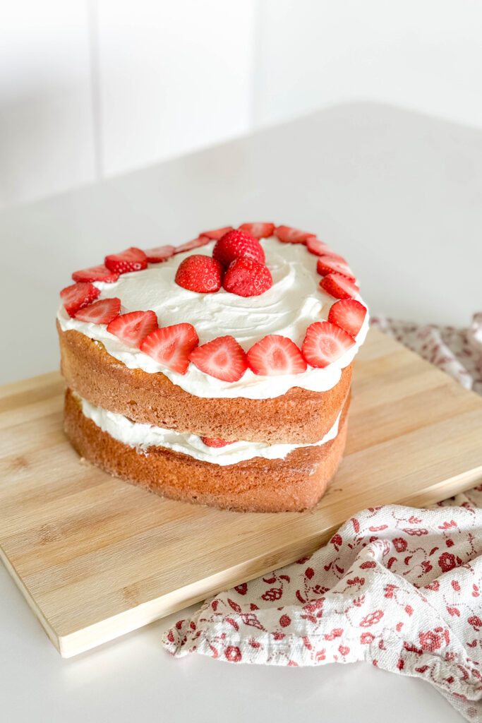 Want to make a strawberry shortcake but without all the hassle? Take a look at how we took advantage of a boxed cake and homemade cream to put together this easiest ever strawberry shortcake recipe.