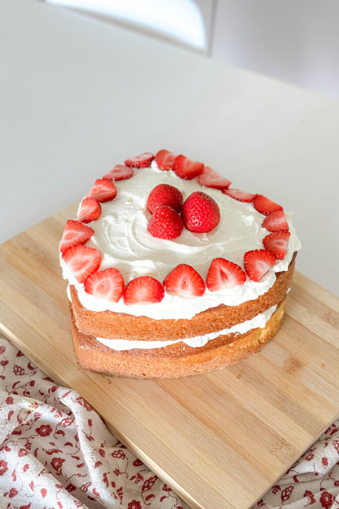 Simplify your dessert game with our effortless strawberry shortcake recipe: boxed cake mix plus homemade cream equals perfection!