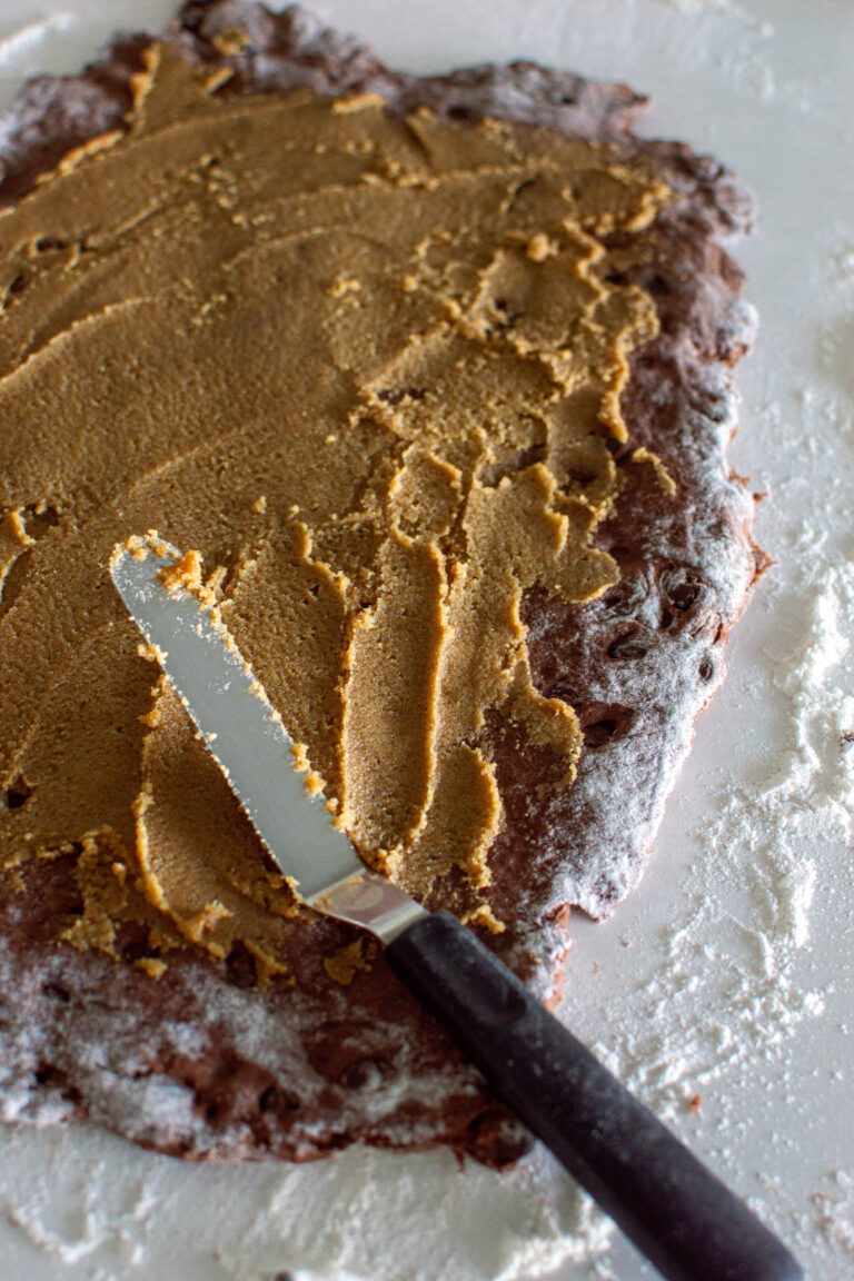 Calling all chocolate enthusiasts! Dive into a world of sweetness with our irresistible Chocolate Cinnamon Rolls. With a cocoa-kissed dough, a tempting chocolate chip topping, and a dreamy powdered sugar glaze.