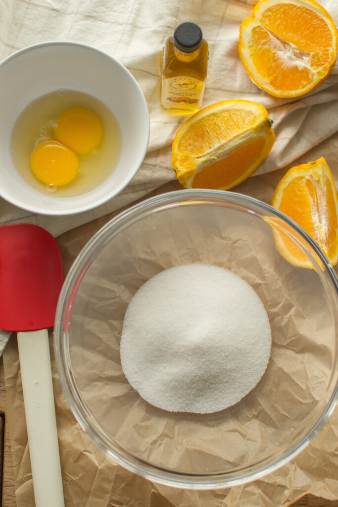 Ingredients for homemade Orange Creamsicle Cookie Bars arranged for baking