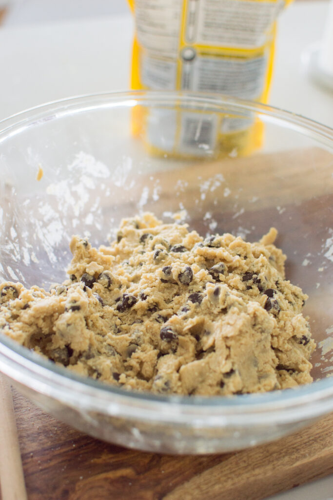 Chocolate chip cookie dough ready for scooping into oversized cookies